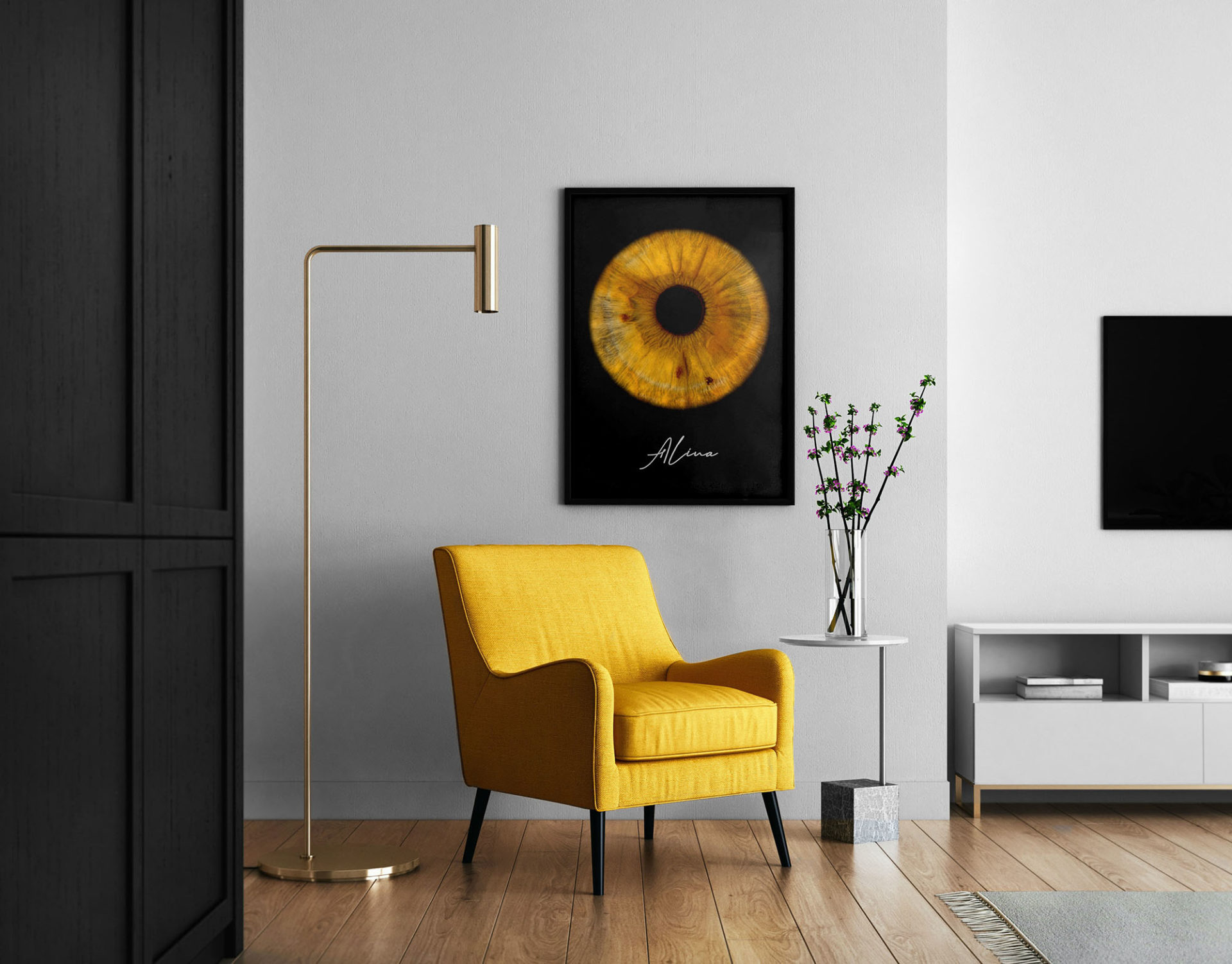 Une photo d'iris dans un grand cadre chez soi, au mur devant un fauteuil design